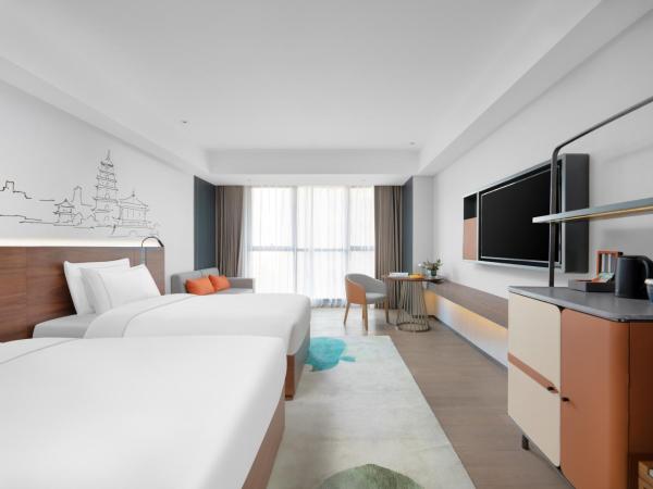 UrCove Xi'an Hi-Tech Software Park : photo 2 de la chambre chambre lits jumeaux supérieure