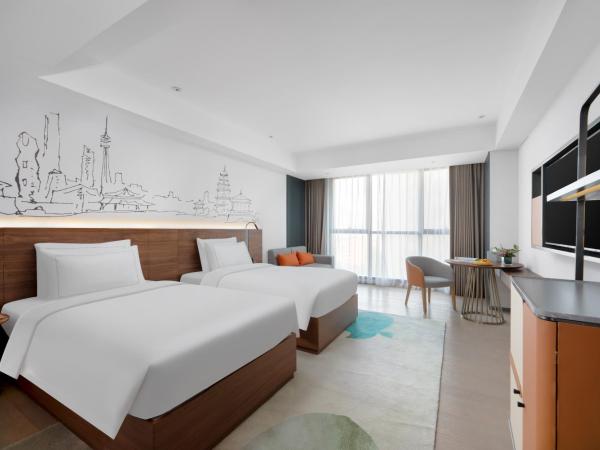 UrCove Xi'an Hi-Tech Software Park : photo 1 de la chambre chambre lits jumeaux supérieure