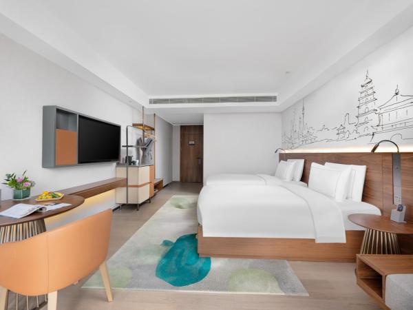 UrCove Xi'an Hi-Tech Software Park : photo 3 de la chambre chambre lits jumeaux supérieure