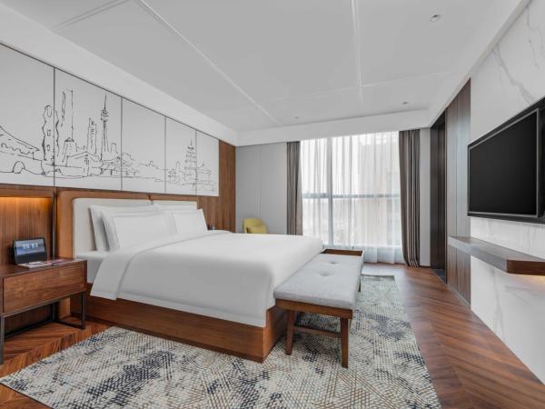 UrCove Xi'an Hi-Tech Software Park : photo 2 de la chambre chambre lit queen-size deluxe