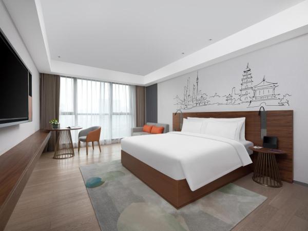 UrCove Xi'an Hi-Tech Software Park : photo 4 de la chambre chambre supérieure lit queen-size