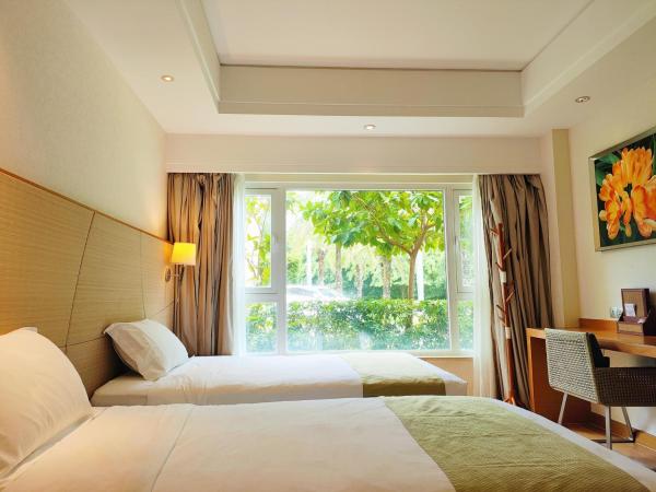 Ocean View Resort Yalong Bay : photo 7 de la chambre chambre double ou lits jumeaux supérieure - vue sur montagnes