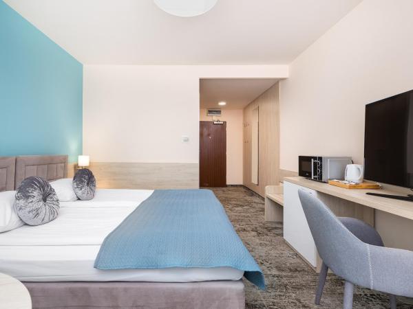 Apartments on the Parsęta River Kołobrzeg by Noclegi Renters : photo 7 de la chambre studio