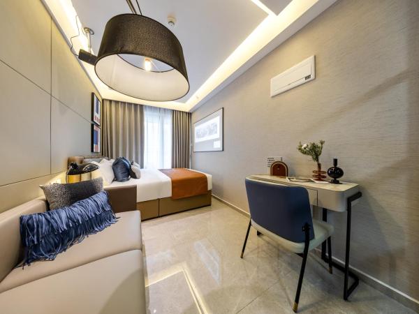 Boruisi Video and Audio Light House - Shenzhen Convention and Exhibition Center Gangxia Metro Station : photo 4 de la chambre chambre lit king-size supérieure