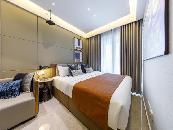 Boruisi Video and Audio Light House - Shenzhen Convention and Exhibition Center Gangxia Metro Station : photo 1 de la chambre chambre lit king-size supérieure