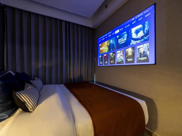 Boruisi Video and Audio Light House - Shenzhen Convention and Exhibition Center Gangxia Metro Station : photo 7 de la chambre chambre lit king-size supérieure