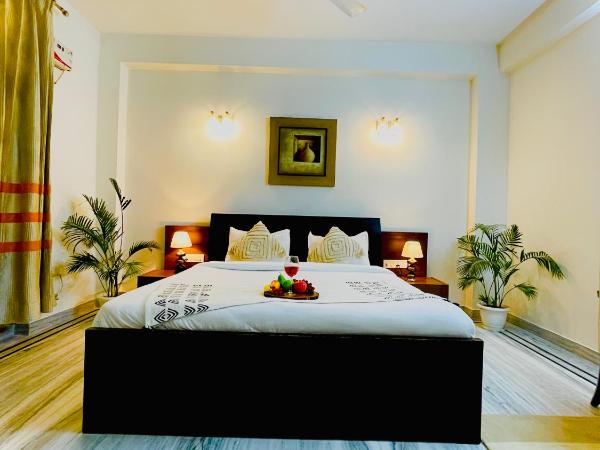 BedChambers Service Apartment, South City 1 : photo 5 de la chambre appartement 3 chambres