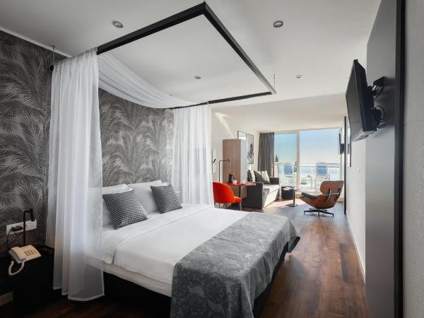 Hotel Mimosa Lido Palace - Maslinica Hotels & Resorts : photo 1 de la chambre suite junior - vue sur mer