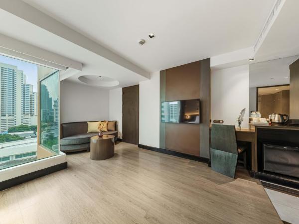 Golden Tulip Mandison Suites : photo 5 de la chambre suite lit king-size exécutive