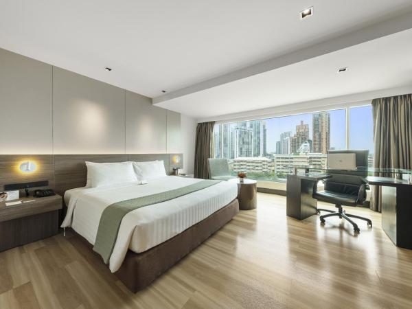 Golden Tulip Mandison Suites : photo 1 de la chambre suite lit king-size exécutive