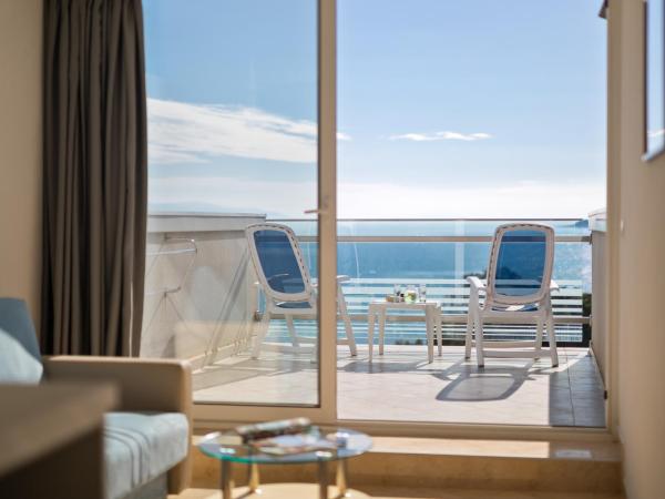 Hotel Mimosa Lido Palace - Maslinica Hotels & Resorts : photo 5 de la chambre chambre double avec balcon - vue sur mer