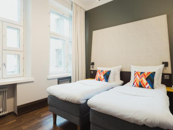 Hotel Klaus K : photo 1 de la chambre chambre lits jumeaux pour personnes à mobilité réduite