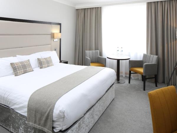 Menlo Park Hotel : photo 1 de la chambre chambre lit king-size avec climatisation
