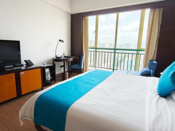 Shengyi Holiday Villa Hotel : photo 1 de la chambre chambre lit king-size - vue sur ville