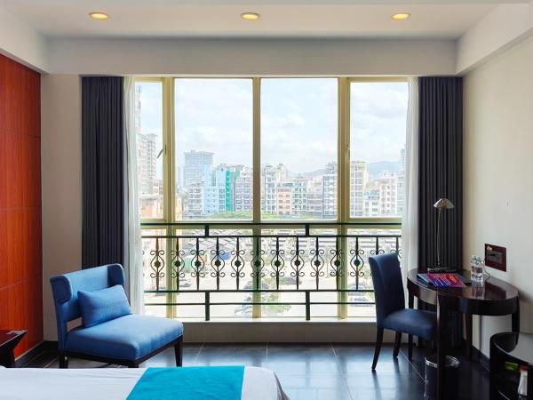 Shengyi Holiday Villa Hotel : photo 4 de la chambre chambre lits jumeaux - vue sur ville
