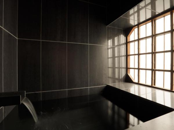 Sowaka : photo 4 de la chambre chambre lits jumeaux deluxe - mur naguri (bâtiment principal)