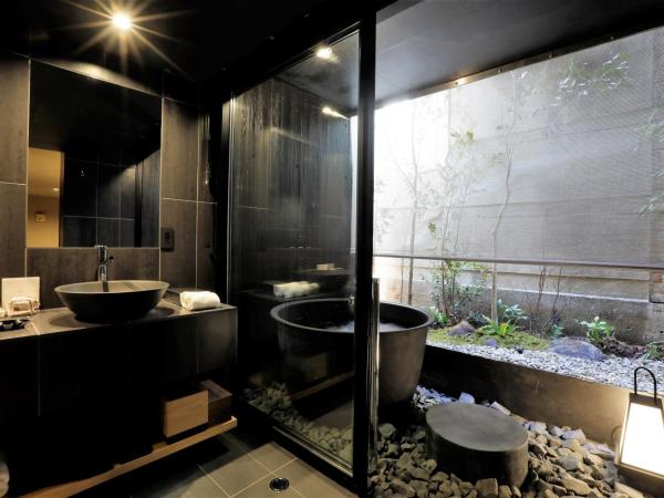 Sowaka : photo 3 de la chambre chambre lit king-size deluxe avec baignoire en plein air - vue sur cour (annexe) - rez-de-chaussée