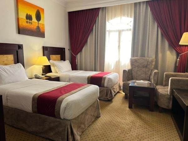 Caesar Hotel : photo 1 de la chambre chambre lits jumeaux