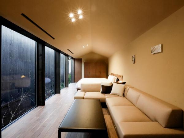 Sowaka : photo 4 de la chambre chambre lit king-size supérieure - vue sur jardin (annexe)