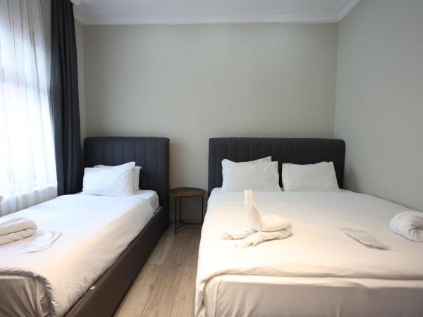 Bucoleon by Cheers : photo 10 de la chambre chambre triple standard