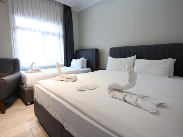 Bucoleon by Cheers : photo 5 de la chambre chambre triple standard