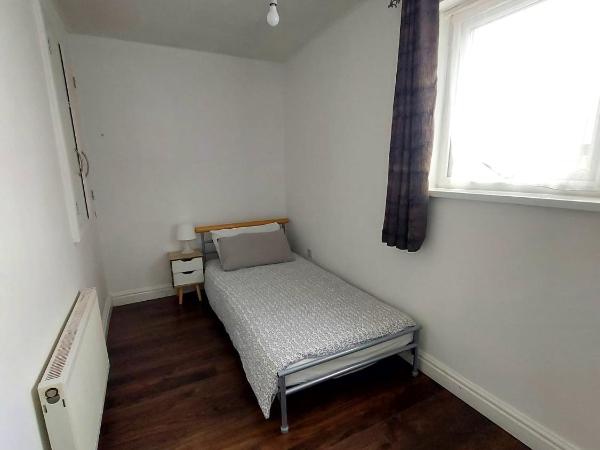 kelsall guest house : photo 1 de la chambre chambre simple avec toilettes et douche communes