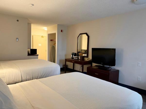 Divya Sutra Plaza and Conference Centre Calgary Airport : photo 6 de la chambre chambre double lit queen-size supérieure 