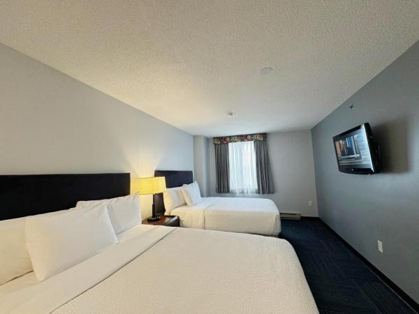 Divya Sutra Plaza and Conference Centre Calgary Airport : photo 4 de la chambre suite familiale