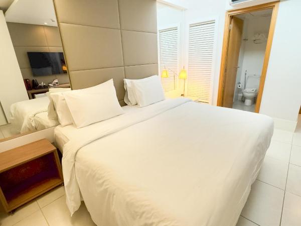 Hilton Garden Inn Belo Horizonte Lourdes : photo 2 de la chambre quarto deluxe com cama queen-size