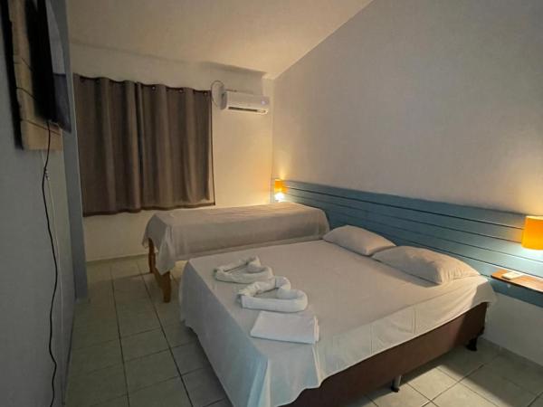 Pousada Encanto dos Mares : photo 3 de la chambre suite