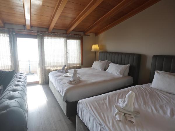 Bucoleon by Cheers : photo 10 de la chambre suite avec baignoire spa