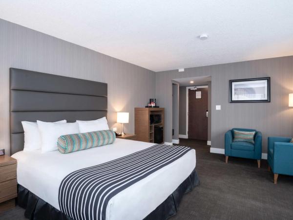 Sandman Signature Calgary Downtown Hotel : photo 1 de la chambre chambre standard 1 lit king-size 