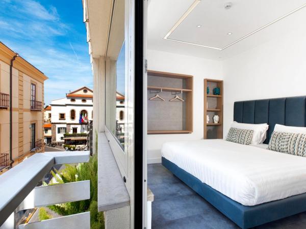 Hotel Tasso Suites & Spa : photo 9 de la chambre suite junior