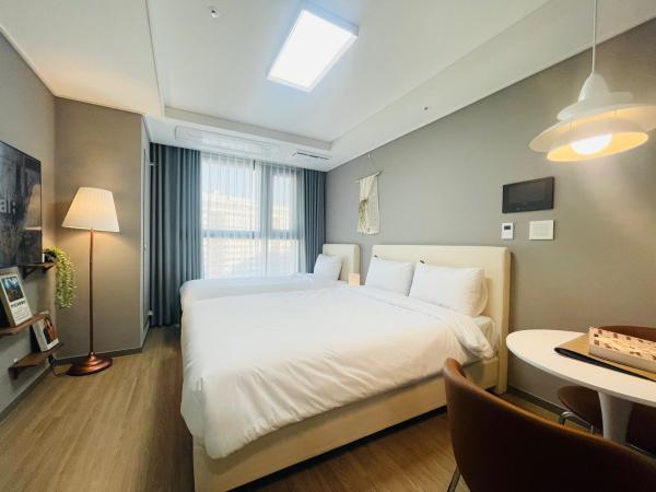 INN-The City MyeongDong : photo 7 de la chambre chambre lits jumeaux - vue sur ville