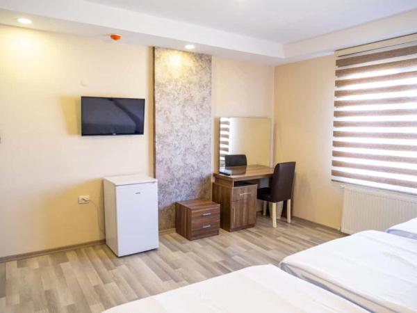 İkarus Hotel : photo 10 de la chambre chambre triple deluxe