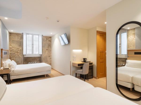 Hotel Praza Quintana : photo 1 de la chambre chambre quadruple