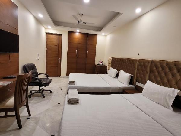 JMD Residency : photo 2 de la chambre chambre familiale