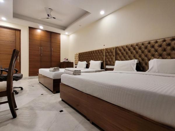 JMD Residency : photo 3 de la chambre chambre familiale