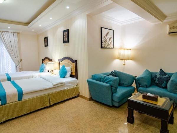 Garden Hotel Muscat By Royal Titan Group : photo 2 de la chambre suite lits jumeaux