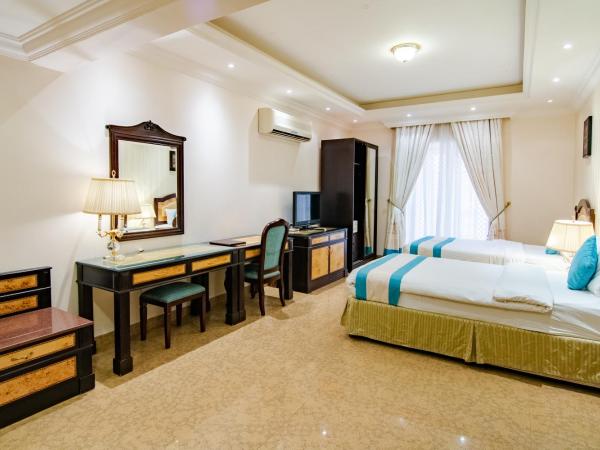 Garden Hotel Muscat By Royal Titan Group : photo 5 de la chambre suite lits jumeaux