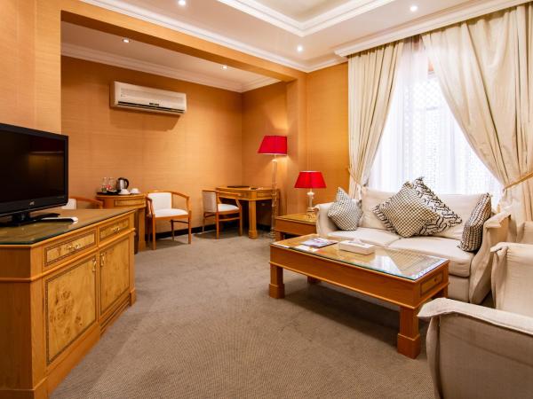 Garden Hotel Muscat By Royal Titan Group : photo 7 de la chambre suite lit king-size