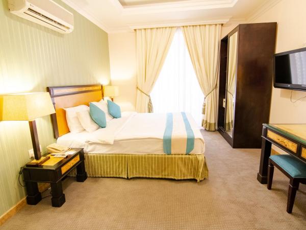 Garden Hotel Muscat By Royal Titan Group : photo 10 de la chambre suite lit king-size