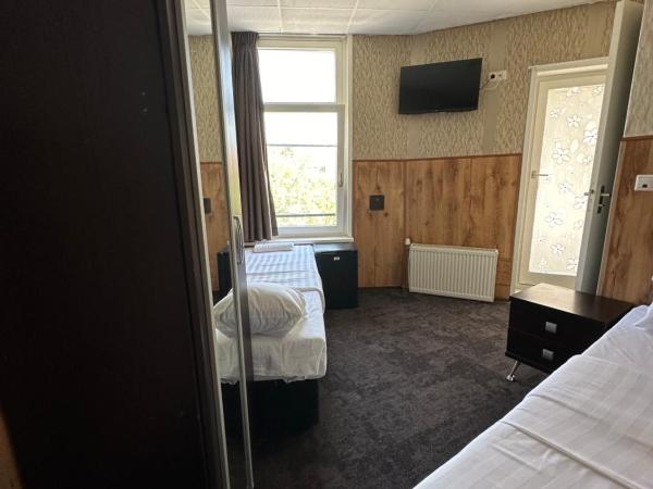 Flex-Inn : photo 3 de la chambre chambre lits jumeaux avec balcon