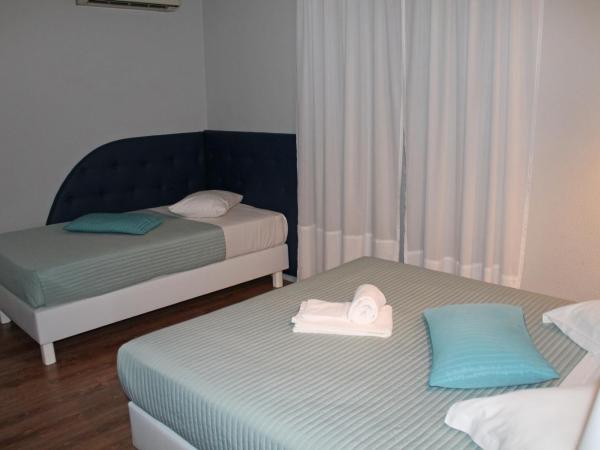 Hotel Porto Nobre : photo 6 de la chambre chambre double avec lit d'appoint
