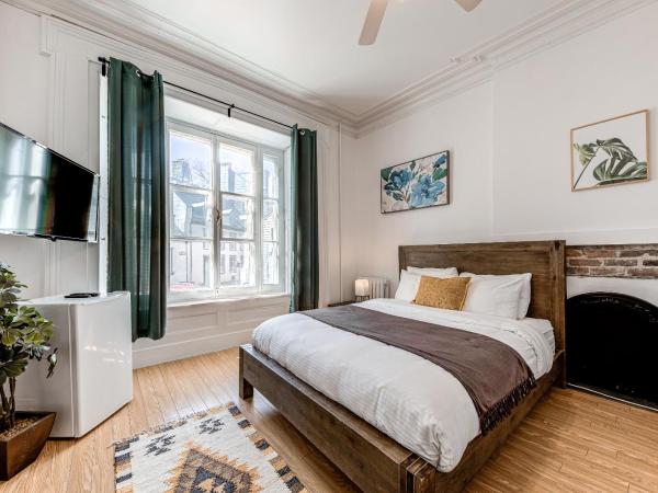 Hôtel Automatisé Manoir des Remparts : photo 2 de la chambre chambre lit queen-size