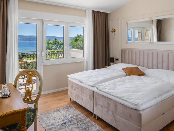 Storge Boutique Bed & Breakfast : photo 6 de la chambre chambre double deluxe - vue sur mer