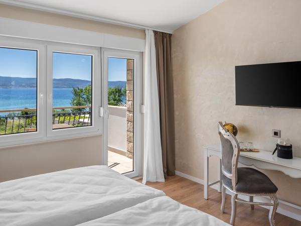 Storge Boutique Bed & Breakfast : photo 1 de la chambre chambre double deluxe - vue sur mer