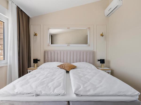 Storge Boutique Bed & Breakfast : photo 9 de la chambre chambre double deluxe - vue sur mer