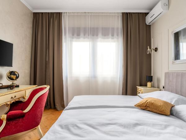 Storge Boutique Bed & Breakfast : photo 7 de la chambre chambre double standard