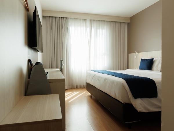 eSuites Belo Horizonte Minascasa : photo 3 de la chambre chambre lit queen-size deluxe